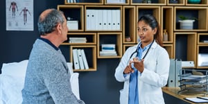 doctor-discussing-care-with-patient-1