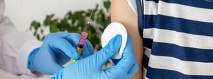 doctor giving vaccine